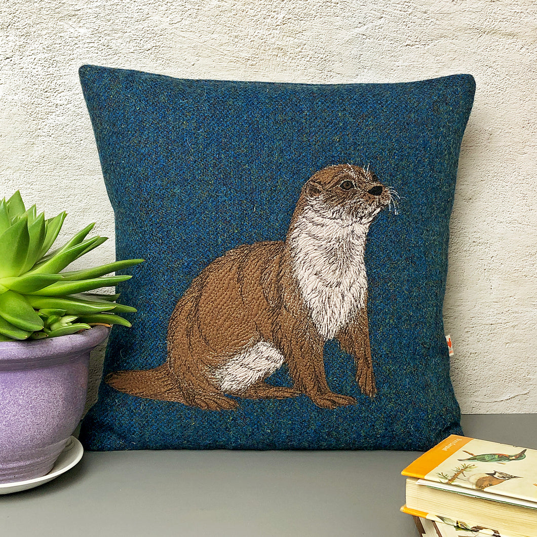Blue Harris Tweed cushion with embroidered otter